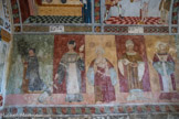 <center>Chapelle saint Sébastien à Roubion. </center> Le  personnage agenouillé serait peut-être le prêtre Érige Lubonis, donateur de la chapelle. les vertus : l'humilité, la charité, la largesse,