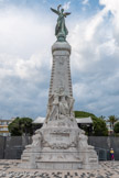<center>Jardin Albert 1er.</center>Monument du centenaire de la réunion de Nice à la France. Une Victoire ailée se dresse au sommet de l’obélisque, enveloppée dans un drapeau français et prêtant serment de fidélité, allusion à la devise de la ville « Nissa fidelissima ». ; au pied, la France assise enlace du bras droit Nice qui vient à elle. La France ne porte pas de bonnet phrygien mais un casque et son sein n’est pas dénudé. Son allure est calme, ce qui l’associe à l’idée d’ordre. C’est donc une République modérée, prudente et légaliste, à la fois maternelle, rassurante et pacificatrice. La ville de Nice est coiffée de ses murailles, reprenant ainsi une vieille représentation médiévale. On peut y voir une allusion à la dédition de la ville aux comtes de Savoie en 1388, ce qui présenterait la réunion de 1793 comme une sorte de nouvelle dédition, à la France cette fois. Sur la face avant de la pyramide figurent les dates 1793-1893 et en dessous : 1860. Le monument a donc pour but de commémorer non seulement la réunion de 1793, mais également celle de 1860. L'architecte est Jules Febvre, le sculpteur André Joseph Allar, le fondeur Capitain-Gény .