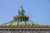 <center>L'opéra Garnier. </center>Apollon, la Poésie et la Musique, entre 1860 et 1869 par Aimé Millet. La frise est régulière et on ne compte que six masques théâtraux tragiques et comiques en bronze doré différents qui se succèdent. Cette frise a été réalisée par le sculpteur Jean-Baptiste Klagmann.