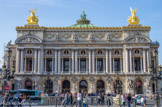 <center>L'opéra Garnier. </center>L'Opéra, ou Académie nationale de musique et de danse, est un somptueux édifice, dû à l'architecte Charles Garnier (projet adopté en 1861, première pierre posée en 1862, inauguration en 1875; restauré et modernisé en 1936-1937). On accède au vestibule par sept arcades décorées de statues symboliques (« la peinture et la sculpture » par Théodore Gruyère, et « l’architecture et l’industrie » par Jean Petit) surplombées de médaillons sculptés par Charles Gumery. Sur le toit, l'Harmonie et la Poésie, groupes galvanoplastiques par Gumery.