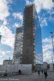 <center>Bibliothèque François Mitterrand.</center> Elle occupe un site de 7,5 hectares pour une esplanade de 60 000 m2. Le bâtiment est caractérisé par quatre grandes tours angulaires de 79 m chacune figurant symboliquement quatre livres ouverts. Chaque tour porte un nom : Tour des Temps,  Tour des Lois, Tour des Nombres et Tour des Lettres.