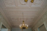 <center>Conseil Constitutionnel.</center> Salle à manger.  Plafond à caissons agrémentés de grecques et rosaces.