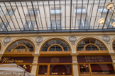 <center>Galerie Vivienne.  </center>  Ouverte au public en, 1826 en même temps que sa concurrente la Galerie Colbert, la Galerie Marchoux, vite baptisée Vivienne, présentait un décor exaltant le commerce : l'ancre pour le commerce maritime, la corne d'abondance, le caducée de Mercure, protecteur du commerce.