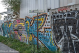 <center>Parc de la Villette </center> Murs tagués de Lafarge.