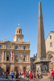 <center>Place de la République. </center> Les lions de pierre, initialement placés au XVIIe siècle, furent ramplacés en 1829 par des lions de bronze sculptés par Dantan. En 1866-1867, Henri Révoil restaure l'édifice et y ajoute fontaines et bassin, décorés de masques d'Hercule. En 1866, les ornements de la pointe sont définitivement retirés, et remplacés par un pyramidion de bronze, très discret.