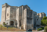 <center>L'Abbaye de Montmajour</center>Façade nord.
La relique de la Vraie Croix conservée dans sa crypte attire une foule de pèlerins amenant la construction de la chapelle reliquaire Sainte-Croix à l'extérieur de la clôture au XIIe siècle. À la fin du XIIIe siècle, l'abbaye étend son pouvoir spirituel de la vallée de l'Isère à la Méditerranée par l'intermédiaire de 56 prieurés. A la fin de la guerre de Cent Ans le monastère fut fortifié pour se protéger des Grandes Compagnies, bandes de mercenaires qui vivaient de pillage. Puis, pendant les guerres de Religion du XVIe siècle, le Parlement de Provence imposa qu'il soit occupé par des soldats. La réforme menée par la congrégation de Saint-Maur au XVIIIe siècle entraîne un nouvel essor et la construction d'un nouveau monastère.