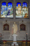 <center>Basilique du Sacré-Cœur. </center> Bas-côté gauche. Statue du Sacré-Cœur. Apparition du Sacré-Cœur de Jésus à Sainte Marguerite Marie à Paray-le-Monial en 1672.