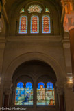 <center>Basilique du Sacré-Cœur. </center>  Les cartons de l'ensemble des verrières du déambulatoire et des chapelles sont également l'œuvre de Henri Pinta. Ils furent exécutés en 1931 par le maître verrier Jacques Charles Champigneulle (Paris). Les six grandes verrières des chapelles latérales de l'église décrivent les étapes historiques du culte du Sacré Cœur de Jésus.