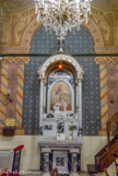<center>St Nicolas de Myre. </center> Autel des trépassés. Un ange tire une âme du purgatoire, sous l'oeil bienveillant de la Vierge et de Jésus.