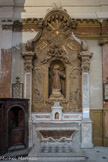 <center>Eglise Saint Théodore. </center>St François d’Assise, fondateur de l’ordre, statue de 1820 en bois recouvert d’un tissu empesé.  La partie basse est du XVIIIe.