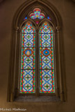 <center>L'église Saint-Michel-Archange </center>Verrière des chapelles.Symboles des litanies de la Vierge. La tour d'ivoire et la Rose Mystique.