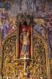 <center>Église Saint-Germain-l'Auxerrois.</center> Dans une niche couronnée d’un dais, statue de la Vierge-Mère, avec sa couronne et son habit bleu, en pierre peinte de l’Ecole Champenoise, du début du XIVe siècle, entourée d'un arbre de Jessé dessiné par Viollet-le-Duc. L'Arbre de Jessé représente le prophète Jessé endormi, et six rois de Juda : Salomon, Osias, Joachim, Asa, Ezechias et Jéchonias, avec deux anges musiciens.
