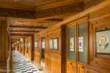 <center>Le château de Chantilly. </center>La galerie Duban. Duban  travaille  à une  desserte le  long du  rez-de-chaussée de la  façade sur  cour  du  Petit  Château  :  la Galerie Duban (1847). Elle permet de desservir l’enfilade  des appartements  privés tout en exposant une  partie  desvitraux  de l’histoire  de Psyché. Elle  fait  presque  trente mètres  de long  pour  deux mètres de large.La Galerieest percée de vingt-six baies rectangulairesdont dix sont garnies de vitraux, certains du XVIe siècle provenant d’Ecouen.