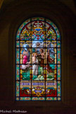 <center> l'église Saint-Pierre-Saint-Paul. </center> Le Baptême de Jésus. Vitrail de H. Garnier, 1885.