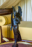 <center>Le château de Malmaison. </center> Chambre à coucher de l’Empereur. Victoire en bronze que tenait la statue de l’Empereur au sommet de la colonne Vendôme, Chaudet, 1810.
