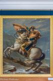 <center>Le château de Malmaison. </center> Chambre à coucher de l’Empereur. Tapis moquette à fleurs, d‘un modèle utilisé dans les palais impériaux. Jacques-Louis David (1748-1825). Ce tableau, commandé à David par le roi d’Espagne Charles IV pour le Palais royal de Madrid, fut peint entre septembre 1800 et janvier 1801 le peintre en exécuta quatre répétitions avec des variantes (aujourd’hui conservées à Versailles, Berlin et Vienne).
Legs Eugénie Bonaparte, princesse de la Moskowa, 1949.