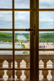 <center>La galerie des Glaces. </center> Vue des jardins de la galerie des glaces. Le parterre d'eau et au fond, le Grand Canal.