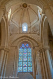<center>Abbaye de Nouaillé-Maupertuis. </center> Le grand clocher-porche est couvert d'une coupole octogonale sur trompes, renforcée par huit nervures, rayonnant autour d'un oculus.