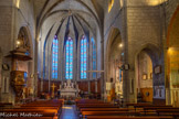 <center>Vias : l'église Saint-Jean-Baptiste </center>L'église est composée d'une large nef unique, de deux travées voûtées d'ogives. Le chœur, très développé, est formé d'une travée droite et d'une abside à sept pans. A l'entré du choeur, la grille de Communion, en fer forgé et doré, de style Louis XV.