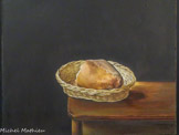<center>La corbeille de pain.</center>Dalí l’expose lors de l’exposition Recent paintings by Salvador Dalí, qui eut lieu à la galerie Bignou de New York, du 20 novembre au 29 décembre 1945 et à son propos, il écrit dans le catalogue : « J’ai peint cette œuvre pendant deux mois de suite, quatre heures par jour. Pendant cette période se sont succédés les épisodes les plus surprenants et sensationnels de l’histoire contemporaine. Cette œuvre a été achevée un jour avant la fin de la guerre. Le pain est l’un des thèmes fétichistes et obsessifs les plus anciens de mon œuvre, celui auquel je suis resté le plus fidèle. Il y a dix-neuf ans, j’ai peint le même thème. Si l’on compare attentivement les deux œuvres, on peut étudier toute l’histoire de la peinture, du charme linéaire du primitivisme à l’hyperesthétisme stéréostopique. Cette œuvre typiquement réaliste est celle qui a le plus satisfait mon imagination. Voici une peinture sur laquelle on ne peut rien dire : c’est l’énigme totale ! ».