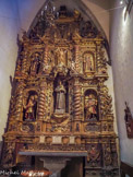<center>Église Santa Maria de Cadaqués. </center>Retable de Saint Antoine de Padoue. Au deuxième registre, Saint Roch et Saint Antoine l'ermite encadrant Saint Jean-Naptiste. 1702.