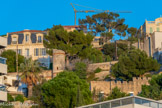 <center></center><center>Le Prophète.</center> Derrière la plage, sur la Corniche, des maisons de tous les styles.