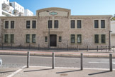 <center></center><center>L'école Chevalier Paul. </center> C'était une manufacture de tissus : les entrepôts Noailles Textiles, construits en 1912.