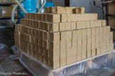 <center>La Savonnerie LE FER A CHEVAL. </center> Le savon solidifié est découpé en cubes puis marqué, sur 6 faces pour le traditionnel savon de Marseille.