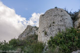 <center>Ruines du château de Saint-Marcel.</center>La tour sud et la courtine. 
Fin du 14e s. La seigneurie de Saint-Marcel fait partie de la baronnie d’Aubagne qui est la propriété de François des Baux.
François de Baux lègue la seigneurie  à sa nièce Alix.
1402. Odon de Villars, époux et tuteur d’Alix, en fait donation à son neveu Philippe de Lévis, dans le cadre  d’un vaste accord avec Raymond de Turenne.
1423 : destruction vraisemblable du château lors du sac des Catalans. Les catalans auraient dynamité le donjon.
1473 : cession de la seigneurie et du château par le roi René aux évêques de Marseille.
En 1481, à la mort du dernier comte de Provence, Charles III, la Provence est rattachée au royaume de France, l'instigateur de se rapprochement se nomme Palamède de Forbin.
1593, en pleine guerre de réligion entre catholiques et protestants, les troupes du duc d'Epernon assiègent Aix en Provence et tentent de prendre les petites places fortes présentes dans le terroir marseillais. A Saint-Marcel, cette agitation a conduit à remettre en état le vieux château fort. La garnison qui a pris place dans le château de Saint-Marcel résiste aux assauts de la  troupe d'hommes d'armes qui avait reçu pour mission de prendre le fort de Saint-Marcel.
21 mai 1647 : cession de la seigneurie et du château aux échevins de Marseille jusqu’à la Révolution française.