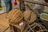 <center>Le Musée des Outils Agraires et des Traditions</center>Panier d'expédition. Née en 1900, fille et femme de paysan, le travail ça me connaît ! Je m’occupe de la maison, des enfants et j’aide mon homme dans les travaux des champs. L’irrigation nous permet de produire de bons et beaux légumes et des fruits gorgés de soleil. Par le chemin de fer, les expéditeurs envoient vers les grandes villes de France et d’Europe, cette production maraîchère et fruitière qui fait la renommée de notre cité. Un siècle plus tard, l’activité agraire se poursuit, notamment avec notre Marché d’intérêt National, le 1er d’Europe en fruits et légumes.