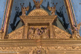 <center>L’église Saint-Nicolas. </center> L'adoration des Mages, surmontée des trois archanges : St Gabriel, St Michel et St Raphaël.