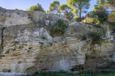 <center>Abbaye de Saint-Roman</center>La plus radicale transformation fut réalisée par la taille de la pente naturelle de la colline, le creusement d'un grand fossé l'entourant et l'ajout de fortifications.