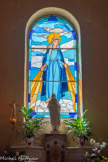 <center>L'Église Saint-Christophe.</center>La chapelle de la Sainte Vierge (autrefois Notre-Dame-des-Neiges, ainsi nommée à cause de la farine blanche moulue dans les moulins de Dardennes.) Ce vitrail et les deux du choeur sont l'oeuvre d'André Bourget et Gwendoline Bonnet, des Ateliers Verre l'Essentiel à Hyères. La Vierge.