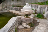 <center>Le Revest-les-Eaux.</center>Le lavoir du village. Petit bassin et fontaine des 4 saisons. Elle se trouvait avant sur la place centrale du village.