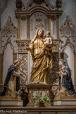 <center>L'Église Saint-Pierre-Saint-Paul. </center>Adossé au mur de la chapelle du Purgatoire, un autel est consacré à la Vierge. Sur cet autel, une statue du XVIIIème siècle en bois sculpté polychrome et doré, représente la Vierge à l’Enfant ; les couronnes en cuivre datent du XIXème siècle ainsi que les effigies de Saint-Dominique et de Sainte-Catherine de Sienne priant de chaque côté de la Vierge.