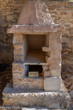 <center>Musée de Tauroetum</center>Le célèbre tombeau maison a été découvert à proximité du site. Seul le sommet émergeait du sol. Il abritait les restes d’un enfant prénommé Gaudens (ou Gaudentius), décédé à l’âge de 5 ans, 6 moiset 13 jours, comme l’indique l’inscription offerte par ses parents, Marcellus et Donata.
Ce type de construction est d’origine orientale. Il est daté du IVème siècle. La chambre inférieure à parements de marbre blanc et gris contenait le cercueil de plomb qui se trouve dans la salle centrale du musée. Ce cercueil contenait le squelette, ainsi que des offrandes : lampe à huile, cruche à pâte claire, noyaux d’olive.