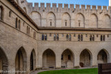 <center>Cloître Benoît XII</center>L'aile du Consistoire, à l'est( à gauche), l'aile des Hôtes, au sud, ou aile du Conclave s'étage sur trois niveaux. Au rez-de-chaussée se trouve le Grand Cellier ; au-dessus, les appartements des bouteillers et des panetiers, et le troisième étage (30 mètres de long et de plain-pied), appelé « chambre de l'Empereur » depuis que Charles IV de Luxembourg y séjourna.
