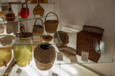 <center>Musée de la vannerie</center>L'osier est un arbrisseau de la famille des saules (salicinées). Il pousse dans tous les terrains à terre végétale, pas nécessairement au bord de l'eau. Il en existe de nombreuses variétés. Celles recherchées pour la vannerie sont les suivantes, cultivées en France :
les viminalis, surtout utilises à l'état brut (non écorcés, non refendus) ; 
les fragilis, pour la vannerie blanche commune (osiers écorces) ; 
les triandras, très appréciés pour la vannerie fine (lacerie) ;
l'osier - dit de vigne, pour sa très grande flexibilité (liens).
Les principaux départements producteurs d'osiers étaient : l'Aisne, la Côte d’Or, la Meurthe et Moselle, la Corrèze, la Vendée, les Charentes, la Haute-Marne et les Vais de Loire et de Garonne.
En vannerie on utilise les pousses de l'année ; les tiges sont coupées de décembre à mai. Les osiers doivent toujours être employés après avoir été séchés au préalable. Ils seront ensuite humidifiés par trempage au fur et à mesure de leur emploi.
L'écorçage des osiers est fait soit à froid à l'aide d'écorçoir ou ciroir à tiges-ressort d'acier, soit à chaud après trempage prolongé dans l’eau bouillante.
Les osiers écorcés sont séchés et blanchis par une longue exposition au soleil.
L’osier blanc est employé en section pleine (osier rond) ou après avoir été refendu en 3 ou 4 brins. Ces brins peuvent être amincis pour obtenir l'éclisse épaisse ou l’éclisse mince utilisée notamment en lacerie.
G. et F. RICARD