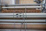 <center>La manufacture Brun de Vian-Tiran.</center>Les anciennes gratteuses possèdent des chardons naturels appelés « chardons cardères ». Aujourd’hui, la production de chardons pour l’industrie textile est terminée, ils sont remplacés par des chardons métalliques. Cette gratteuse est utilisée pour les couvertures haut de gamme.