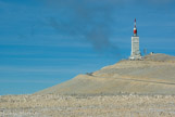 <center>Le Ventoux.</center>La partie sommitale du mont Ventoux est couverte d'éboulis calcaires, ce qui peut faire penser, vu de loin, qu'il y a de la neige à son sommet toute l'année. Depuis 1882, on trouve au mont Ventoux un observatoire de la météorologie nationale qui a été construit selon les plans de l'ingénieur Henri Bouvier (1828-1898). Le bâtiment principal, avec sa tour de 42 mètres de hauteur surmontée d'une antenne de 20 mètres, a été édifié en 1966. Il est actuellement affecté à la base aérienne 115 Orange-Caritata. Un émetteur de télévision, d'une puissance de 195 kW et dont le signal est si puissant qu'on peut le recevoir à plus de 90 kilomètres à la ronde, a été construit à son sommet dans les années 1960, utilisant un pylône de 50 mètres.